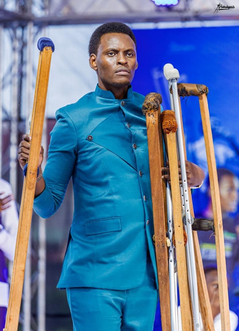 Apostle holding crutches testimony